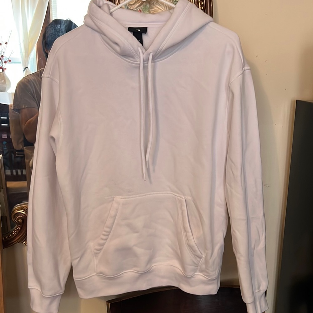 A luxurious white comfy that is guaranteed to banish the cold!